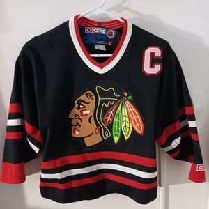CCM Black Hockey Jersey with Red and White Accents